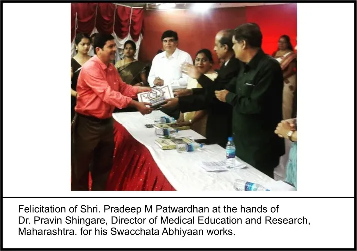 Mr. Patwardhan informing Hon. Commissioner about the developments carried out.